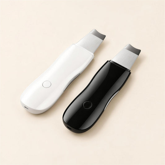 Valmar Sonic Cleansing Spatula in white and black