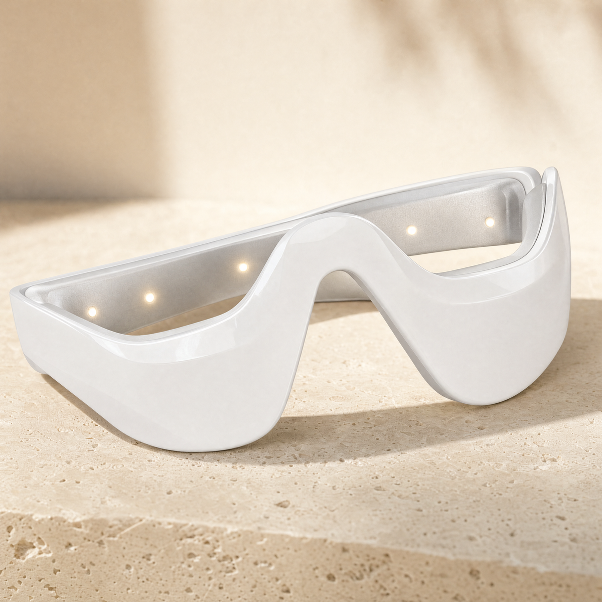 Eye Contour Massager close-up with its soft LED glow