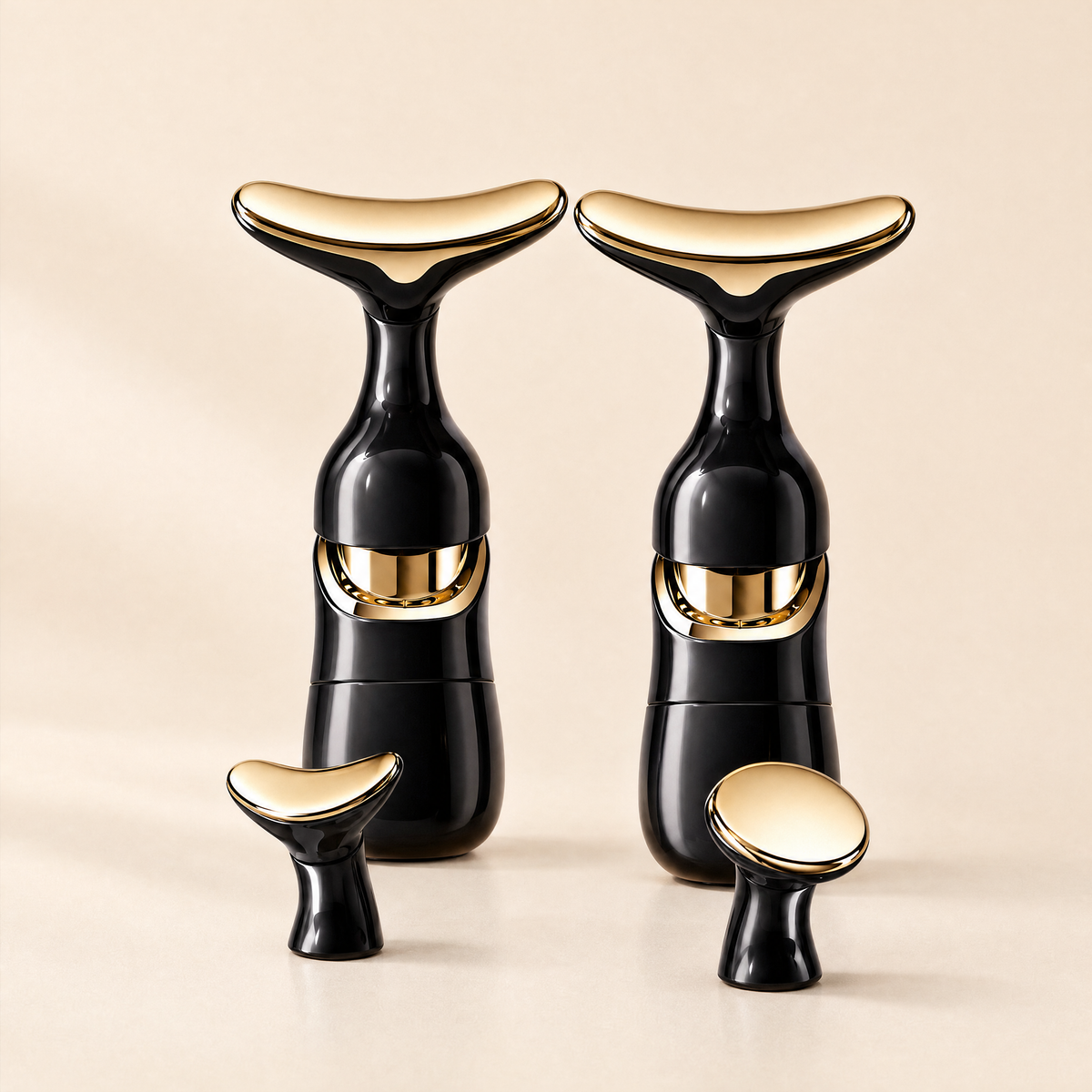Two black-and-gold 3-in-1 Gold Contour Massagers