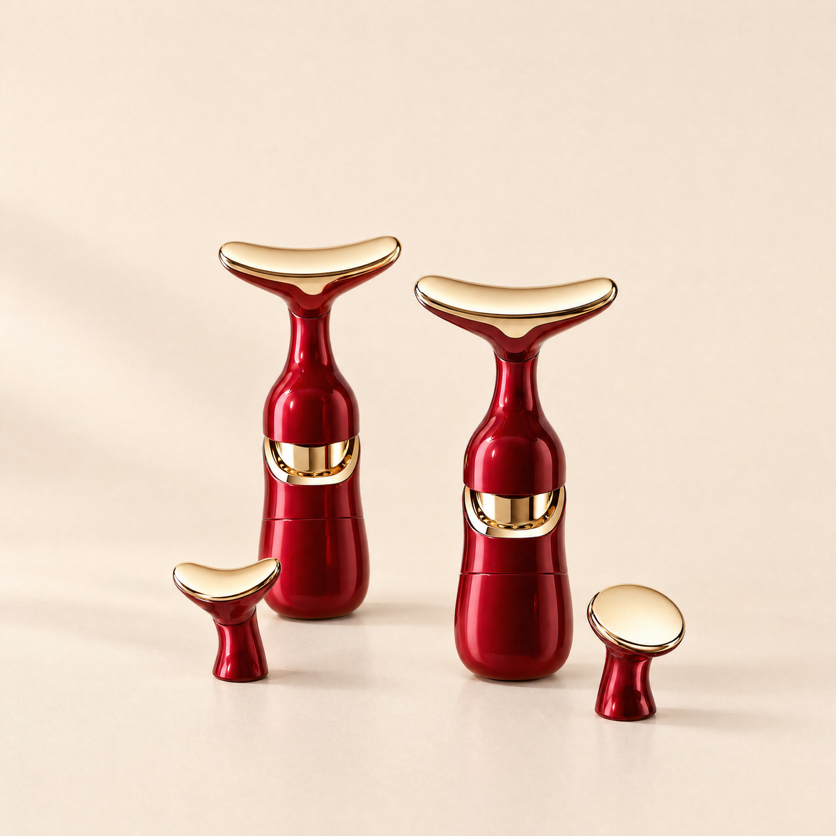 Two red-and-gold 3-in-1 Gold Contour Massagers